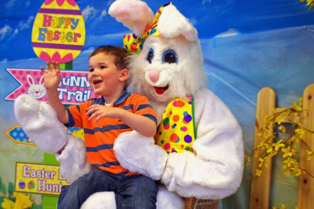 Jacob Potsel, 3, of Barry Lakes came up at least twice to visit with the Easter Bunny.