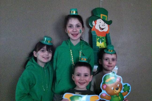 Maggie Silva of Warwick, N.Y. &quot;Four of Warwick's young leprechauns celebrate their Irish heritage. Happy St. Patrick's Day, New York.&quot;