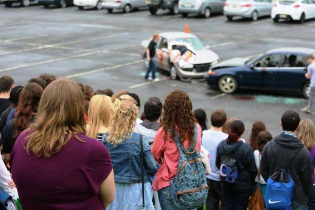 High Point school stages mock accident Scene of a mock drunk driving accident at High Point High School May 15.