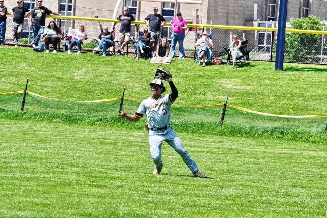 Photos: Vikings advance to semifinal <b>West Milford outfielder Jonas Paulino has the ball in his glove during a play.</b>