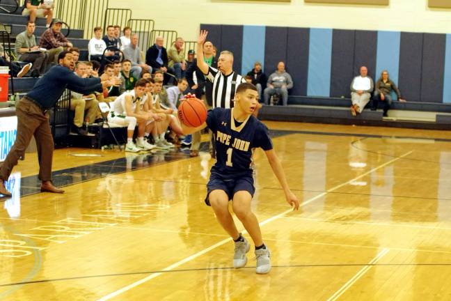 Pope John defeats N. Hunterdon on hardwood Pope John's DiAndre South handles the ball during the fourth period.
