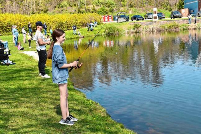 Mia Nepola, 11, tries her luck at the Fishing Derby sponsored by the Vernon PAL and the township Recreation Department. (Photos by Maria Kovic)
