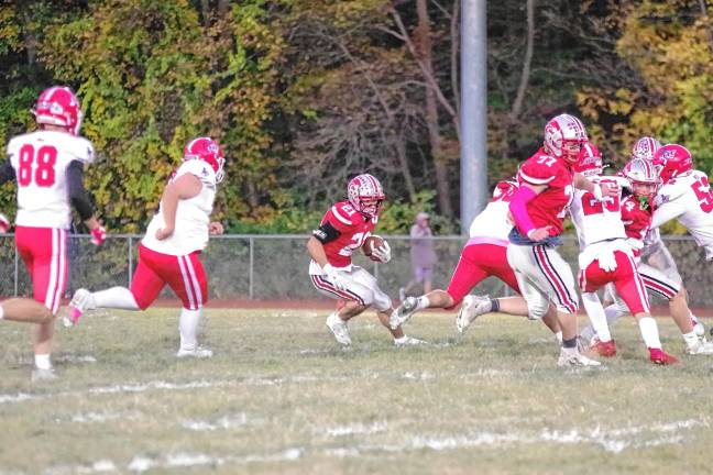 Wildcats claw Patriots, 35-6 <b>High Point ball carrier Brendon Lehman on the move.</b>