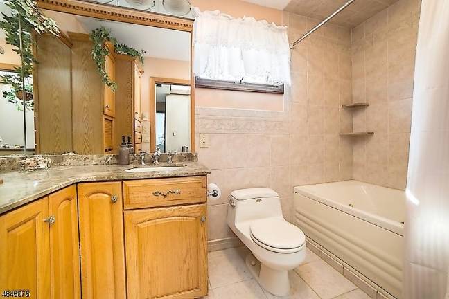 Lake Hopatcong home is set on 100 feet of shoreline Lake Hopatcong home is set on 100 feet of shoreline