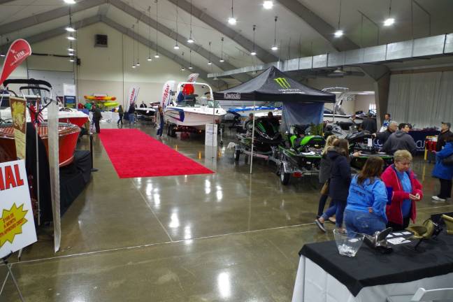 The scene inside the Skylands Stadium Boat Show. Additional boats were outside the events center. The show featured pontoon boats, speedboats, ski boats, fishing boats, kayaks, canoes, accessories and much more.