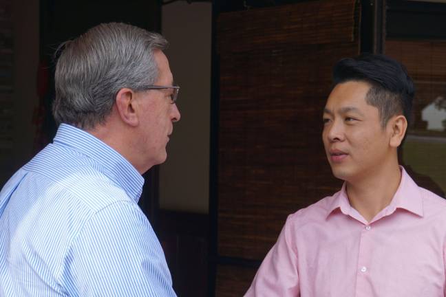 Vernon Township Mayor Victor Marotta speaks with Kingo Wong at Wing's Asian Bistro.