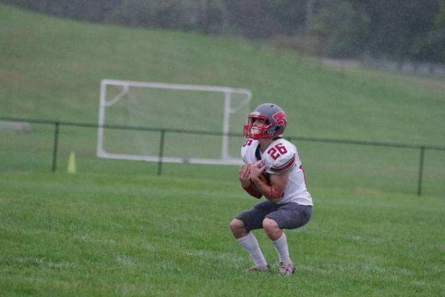 Newton leads division High Point kick returner Dylan Masters catches the ball in the first half.