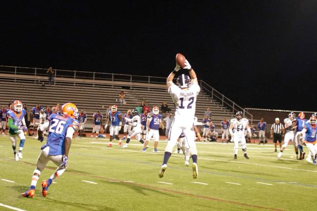Stags wideout Jordan Hallman makes a high catch in the second quarter.