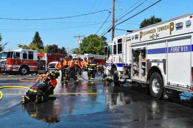 Photos: Dual wetdown in Sussex <b>At left are the new Pierce Engine and new-to-the-department Pierce Mini-Pumper. </b>