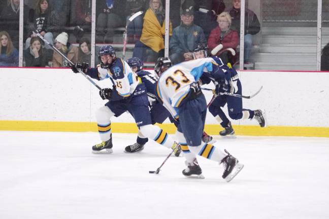 Roxbury defeats Sparta-Jefferson A Sparta-Jefferson United hockey player steers the puck.