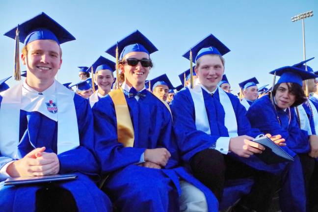 Vernon Township High School graduates, front row from left, are Benjamin Anderson, Samuel Woods, Jack Grosser and Rogelio Hernandez,
