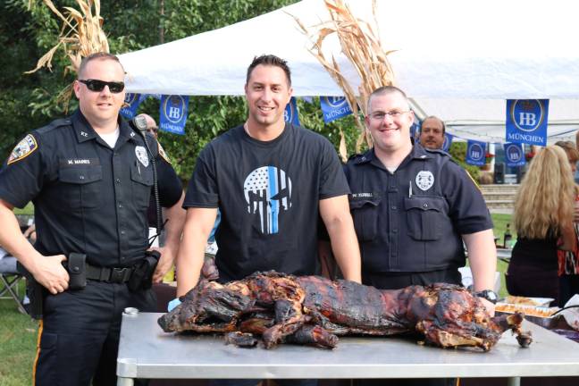 Vernon Police Officers Maines, Kuzicki, and Terrill all attend the annual Oktoberfest celebration.