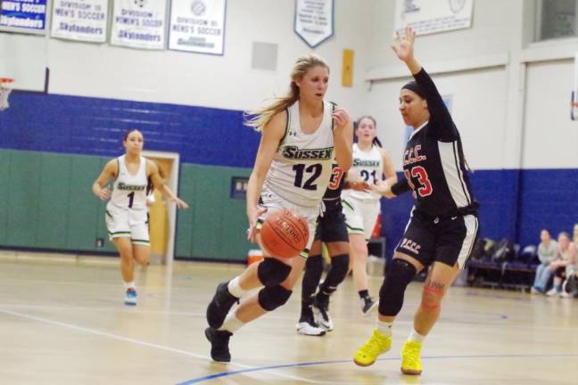 Sussex County's Alyssa Aragona moves the ball past Passaic County's Betsaida Gutierrez in the second quarter.