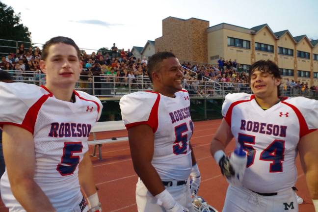 Local football players compete in all-star classic West teammates Jesse Maka (Dover), Aaron Keck (Sparta) and Richard Harty (Montville).