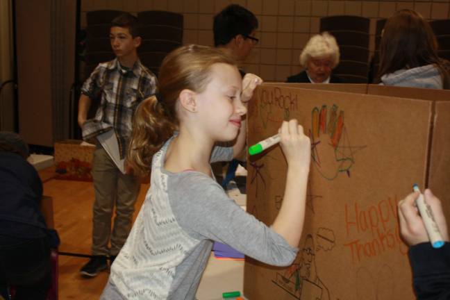 Family Volunteer Day brings out community Elliott Layman, 9.