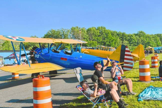 New Jersey Airshow AIR2 People look up at the planes above Greenwood Lake Airport in West Milford. (Photo by Maria Kovic)