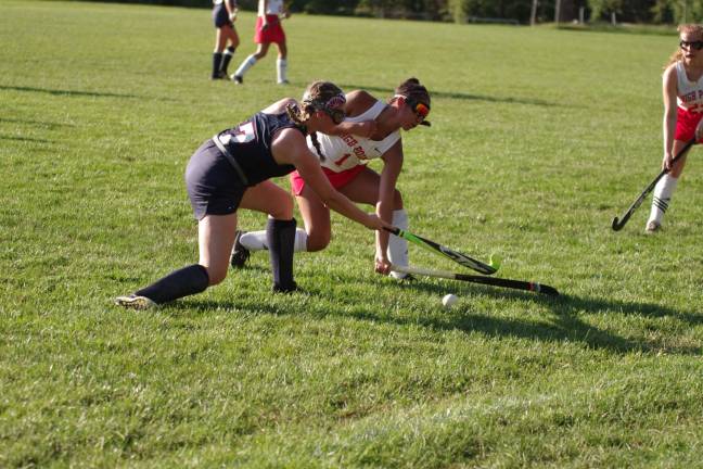 Lenape Valley's Tara Charette and High Point's Katherine Leal clash.