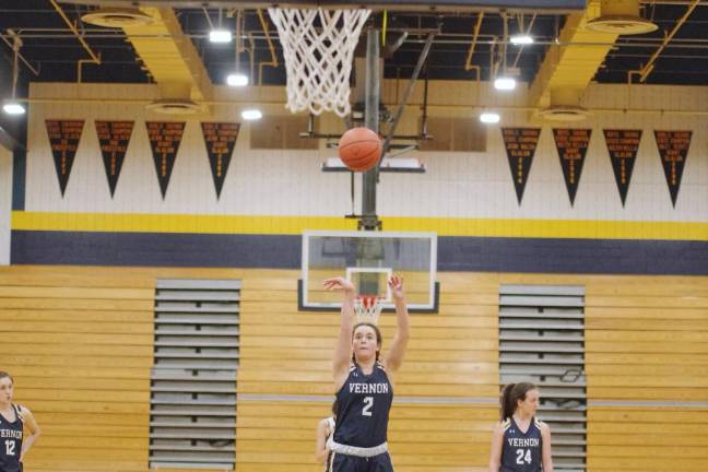 Vernon's Jonnah Castillo releases the ball from the foul line. She scored 17 points and grabbed 14 rebounds.