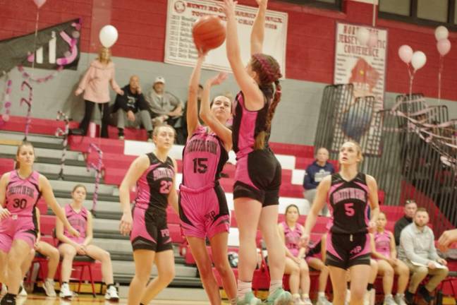 Wallkill Valley's Gabriella Kuhar (15) shoots while a High Point defender tries to block the attempt. Kuhar scored two points, grabbed one rebound and made one steal in the game. (Photos by George Leroy Hunter)