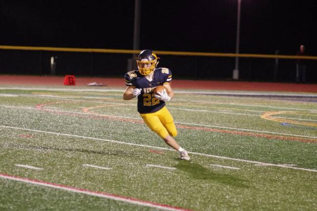 Vernon running back Gavin Bruno is on the run in the first half.