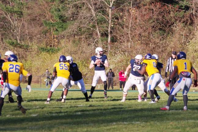 SCCC quarterback James Laubstein holds the ball.