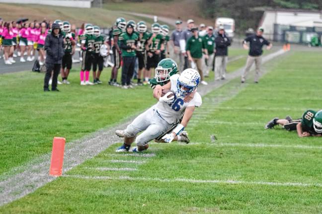 Wildcats claw Patriots, 35-6 <b>FB3 Kittatinny ball carrier Lucas Inglima is brought down just short of the goal line by Sussex Tech cornerback Gavin Gardner in the first half of their game Saturday, Oct. 11 in Sparta. Kittatinny won, 44-12.</b>