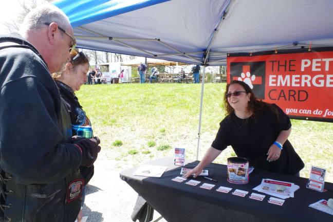 Vernon-based The Pet Emergency Card was one of the organizations on hand. Shown is Judi Maniscalco who explained that the cards are to be kept with a driver&#xfe;&#xc4;&#xf4;s wallet so that in case of an accident or other emergency, police will know how to ensure your pets&#xfe;&#xc4;&#xf4; welfare.