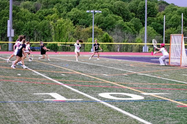 Sports roundup: Janus places 4th in state sectionals <b>A Viking launches the ball toward the Columbia goal.</b>