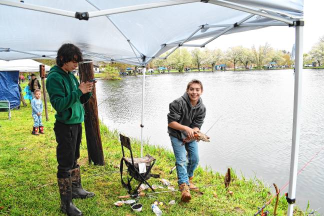 Photos: 63rd annual Small Fry Trout Fishing Contest Alex Conklin, 13, of Wantage holds a fish he caught.