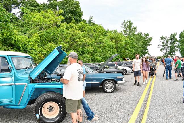 Photos: 2nd annual Car Show in Vernon <b>Residents look over cars on Main Street in Vernon during the township’s second annual Car Show on Sunday, June 22. </b>