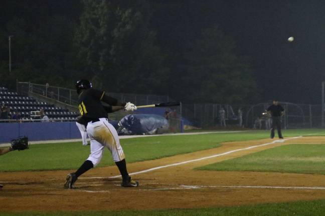 Sussex Miners first baseman connects on a two-run homer in the eighth inning to help lead a comeback against Fargo Saturday. Photo by Taylor Jackson