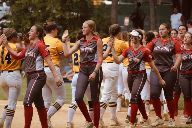 From left, High Point players Grace Meyers, Karli Matthews, Mikayla Conklin, Mia Donofrio and Emma Babcock congratulate members of the Jefferson team.