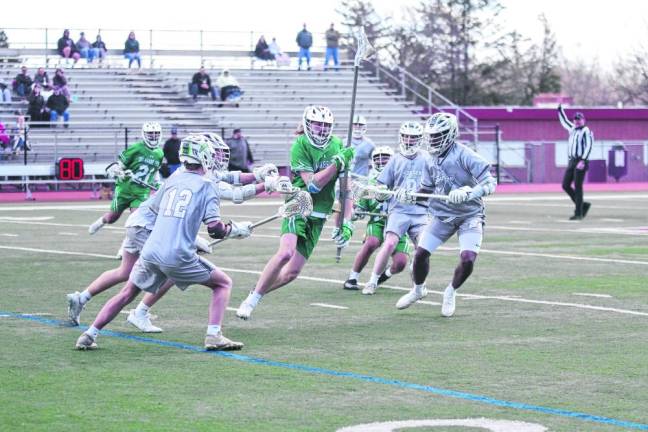 A Delaware Tech Hawk attempts to move the ball past the Sussex Skylanders.