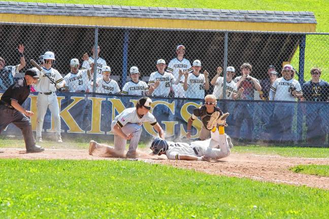 Photos: Vikings advance to semifinal <b>West Milford pitcher Cole Czerepak tags out Vernon runner Joe Rodriguez at home plate in the fifth inning of their game Friday, May 30. Vernon won, 10-5, in the quarterfinal round of the NJSIAA North Jersey, Section 1, Group 2 tournament. The team will face Glen Rock in the semifinal round Tuesday, June 3. (Photos by George Leroy Hunter)</b>