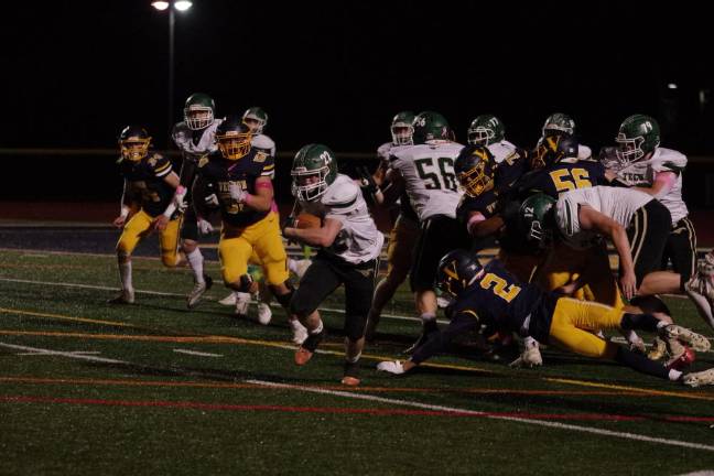 VF2 Sussex Tech running back Andrew Baker moves the ball into the open field. Baker rushed for 117 yards and scored a touchdown.