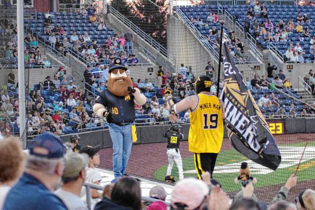 UPDATED: Miners make playoffs <b>Herbie the Miner and Miner Man perform in front of baseball fans.</b>