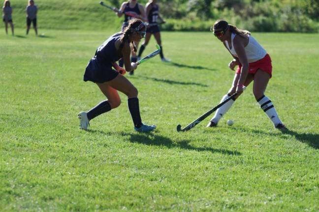 Lenape Valley's Olivia Hickey and High Point's Julianne Mangano face each other as they try to gain control of the ball.