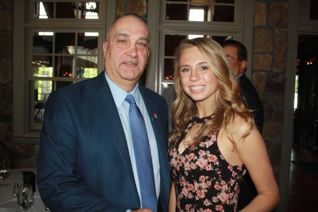 Responders support group presents scholarships President of The 200 Club of Sussex County Tony Torre with Emily Billings, senior at High Point Regional High School and recipient of a $1500 scholarship.
