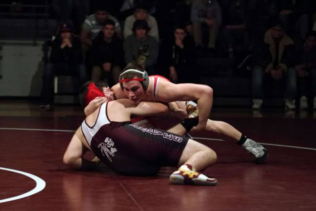 High Point's Kevin Lewis on top of Newton's Nick Zaremski in the 195 lb category. Lewis won the match by pin.