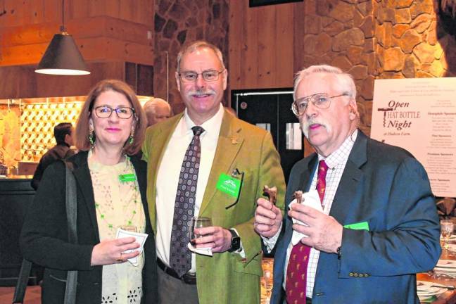 From left are Anne and Paul Krump and Tom Peterson.