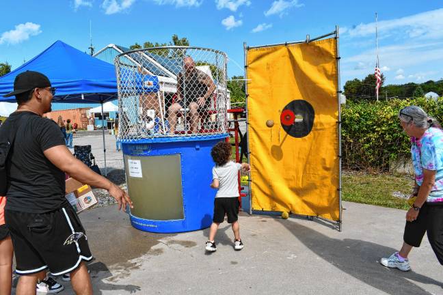 Photos: Vernon Street Fair <b>A boy tries his luck at the dunk tank during the 11th annual Vernon Street Fair on Main Street on Saturday, Sept. 13. </b>