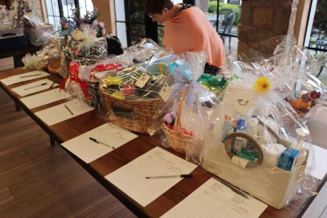 Woman’s Club fashion show to return Gift baskets.