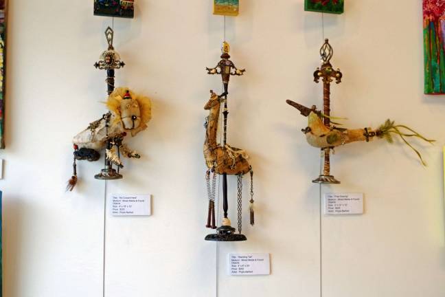 Three unique mixed media/found objects creations by Phylis Barfoot.