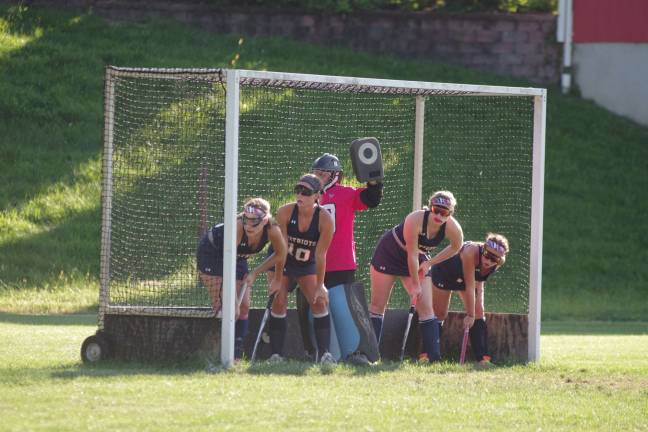 Lenape Valley Patriots wait inside their goal post for the ball to be put in play.