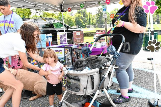 Photos: Wantage Day <b>Olivia Rose of Wantage poses next to a rabbit.</b>