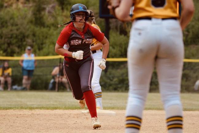 Freshman Grace Meyers runs during the game.