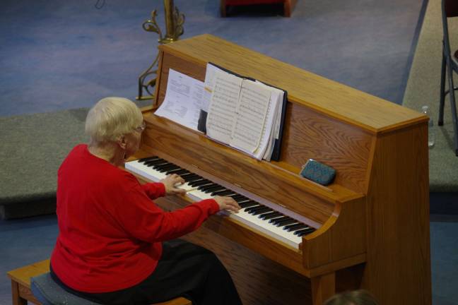 Choral Society performs at St. Thomas church Eleanore O'Mara performed on the piano.