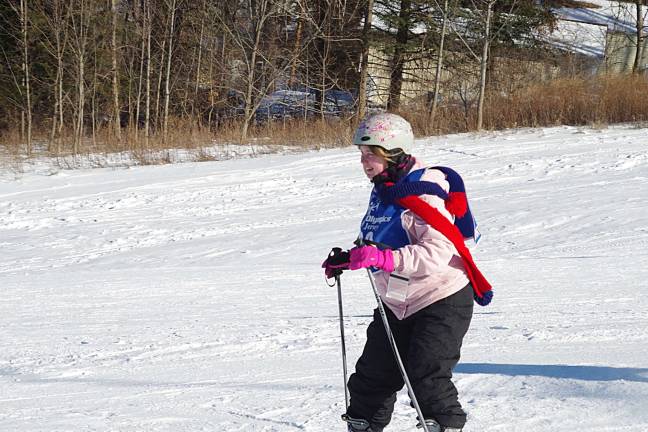 Vernon Mountaineers perform at Special Olympics Carol Spilotras of the Barry Lakes section of Vernon is shown heading down the racecourse at Mountain Creek. Spilotras was first in intermediate slalom and second in intermediate Super G.