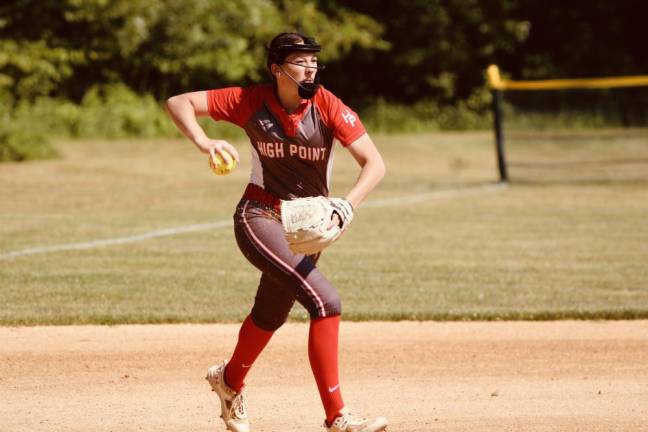 Junior Megan Jennings prepares to throw the ball from third base.