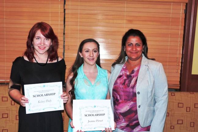Insurance Professionals award scholarships to Vernon students Kelsey Daly, Joanna Pirnat and Nadia Hatzinas, President of Insurance Professionals of Sussex County.